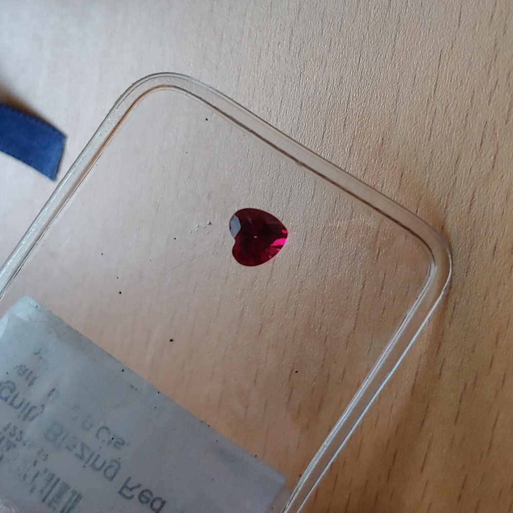 Blazing red topaz .9ct Heart shaped